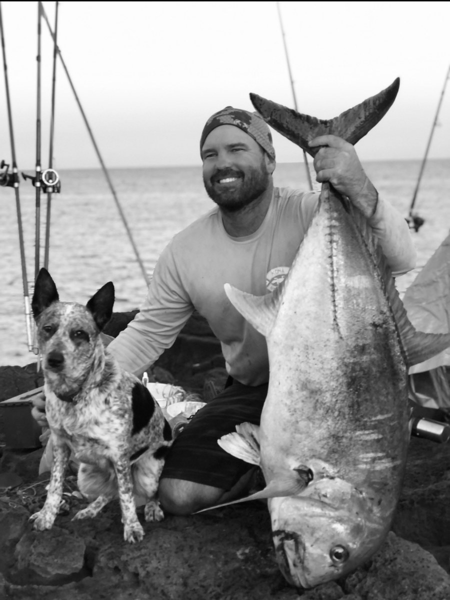 Co-Captain Jordan Kilkenny of Ambush Sportfishing in Kailua-Kona with a Hawaiian ulua